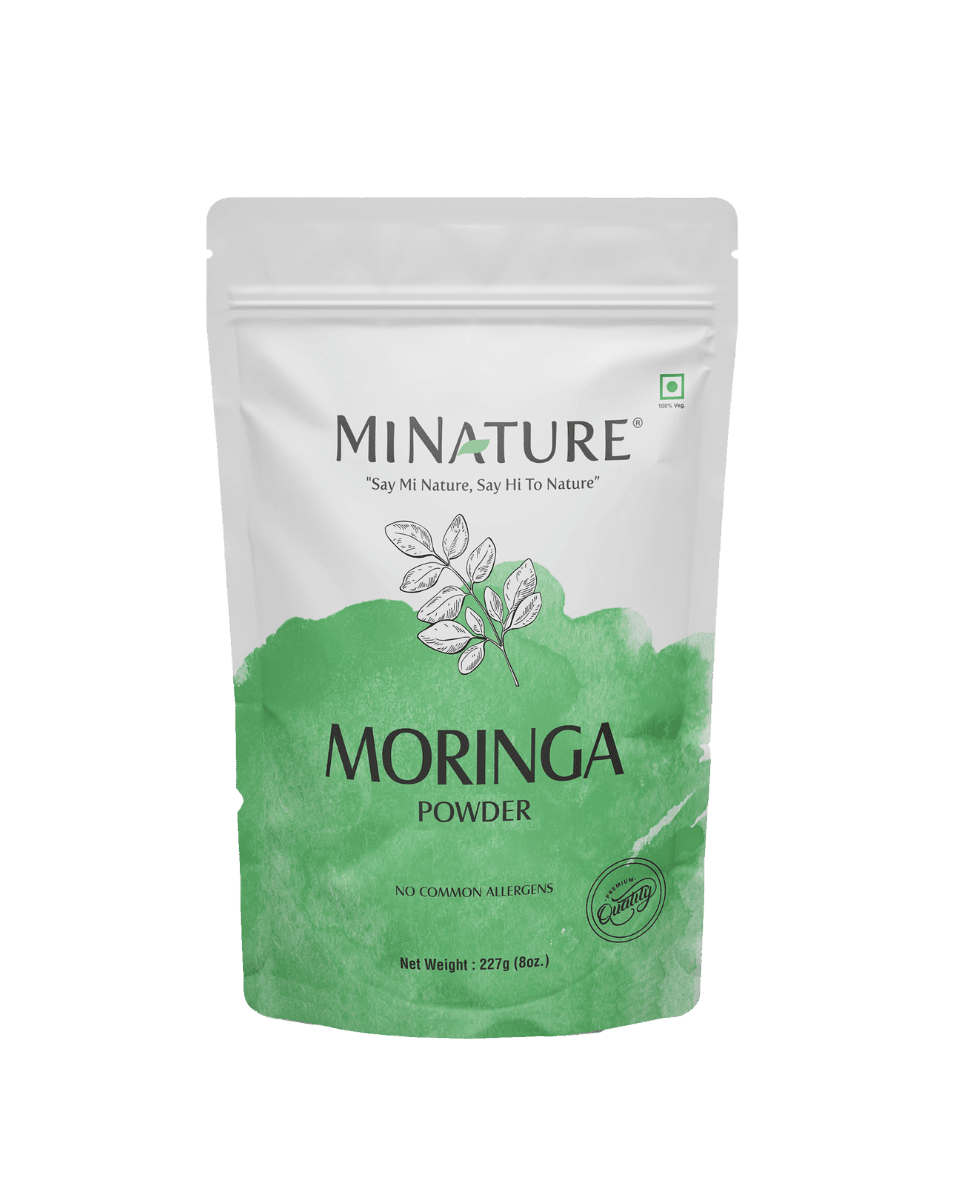 MiNature Moringa powder packaging on a green background